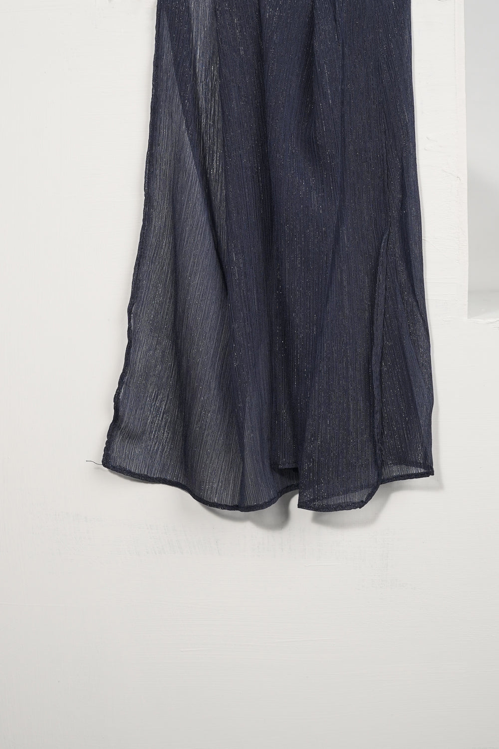 Dark blue fabric on a white background